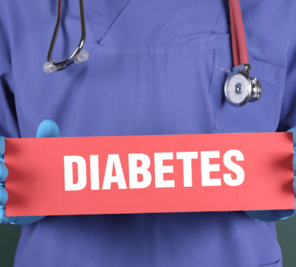 Doctor holding sign: saying "DIABETES"