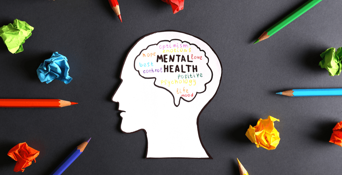 Cut out of brain with mental health words written inside brain