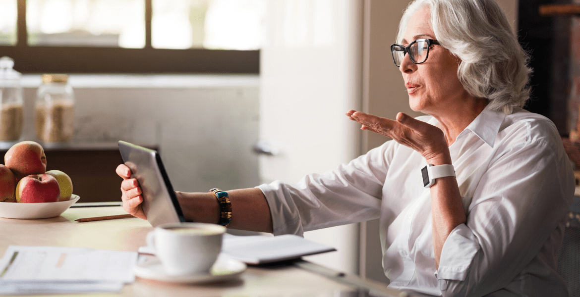 Person talking to their tablet