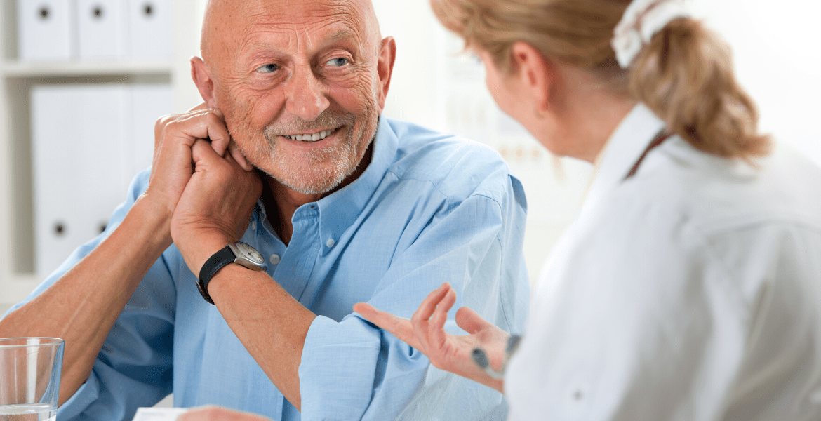 Pharmacist talking to patient