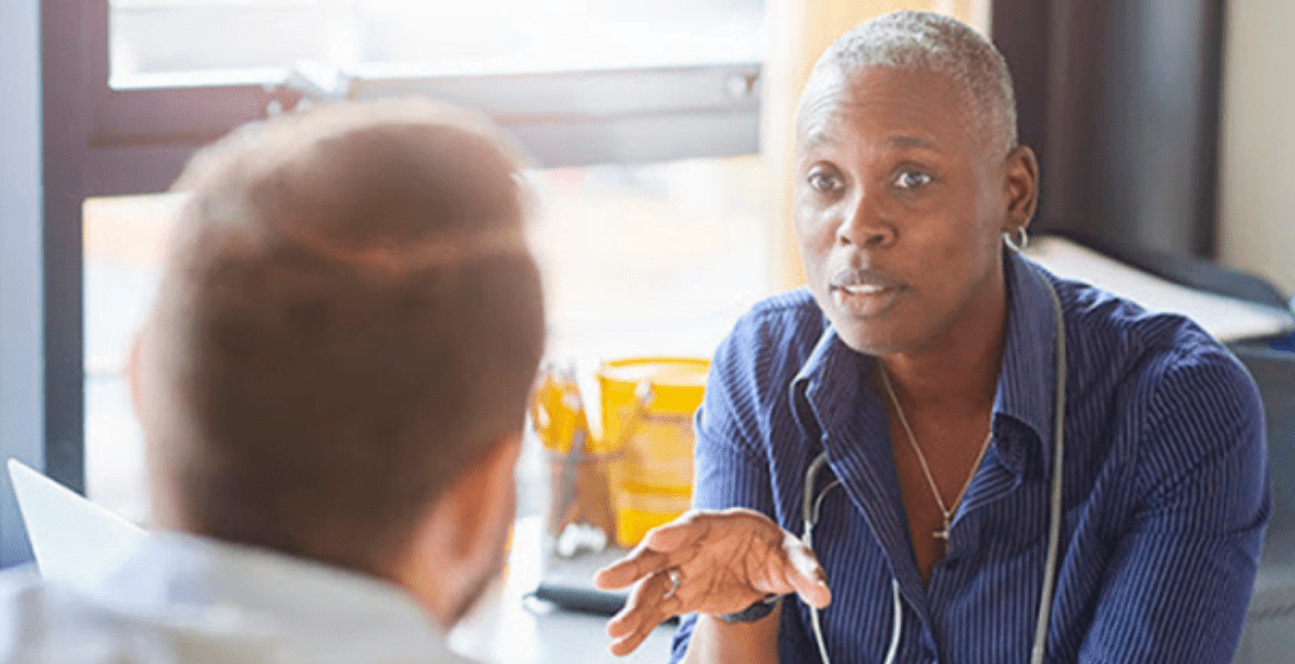 Healthcare professional talking to patient