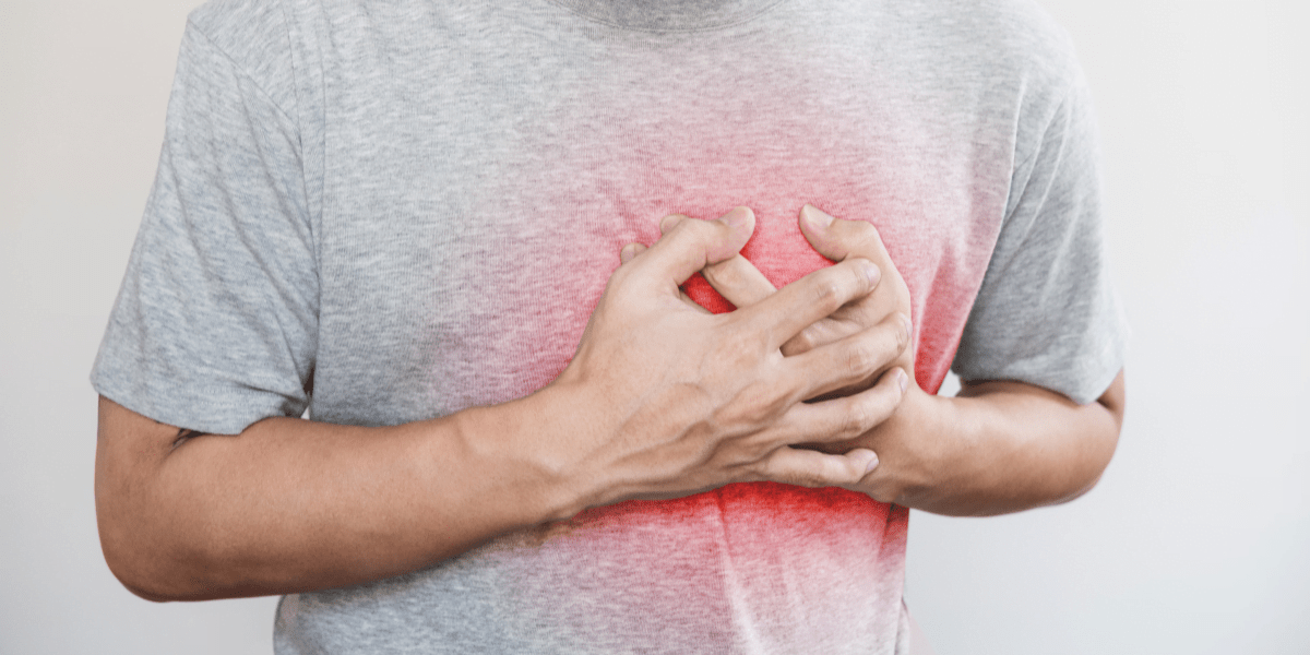 Person holding glowing red chest
