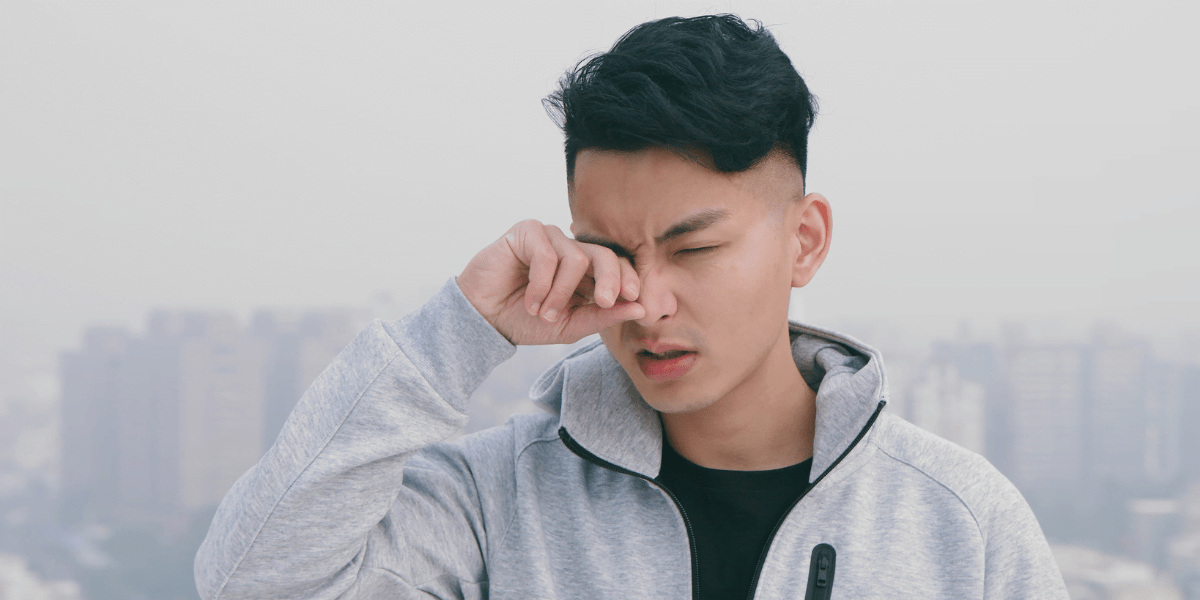 Person itching eyes