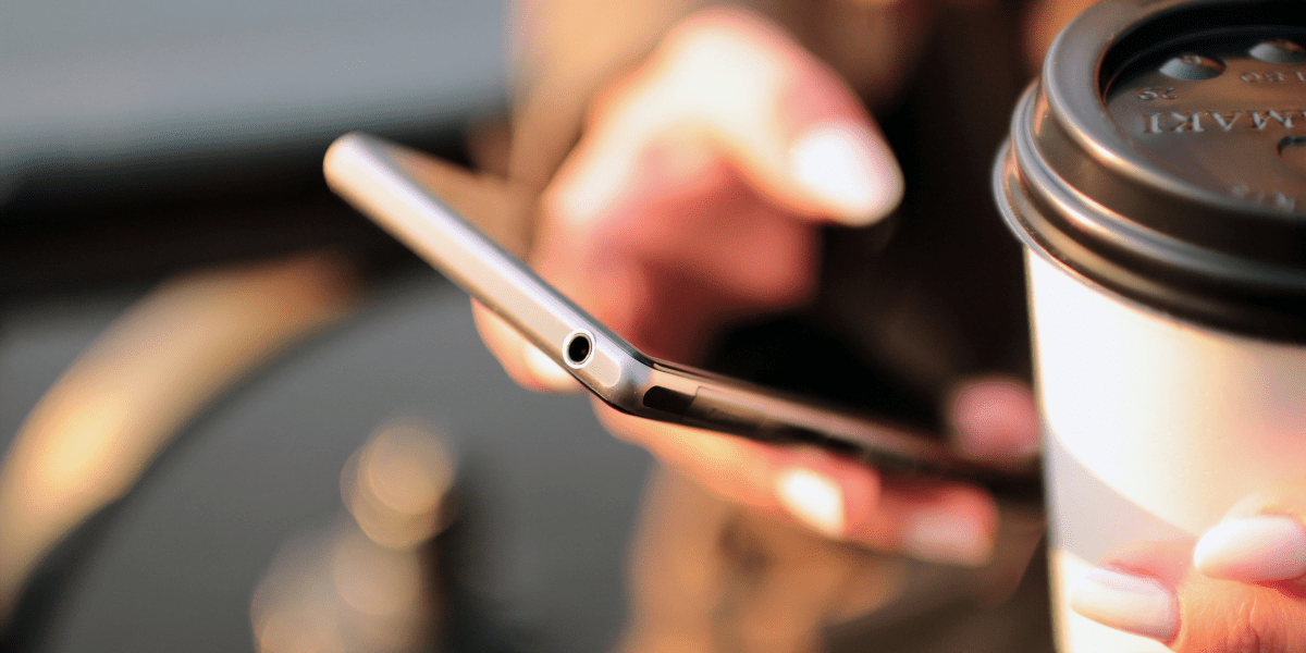 thumbs texting on a phone