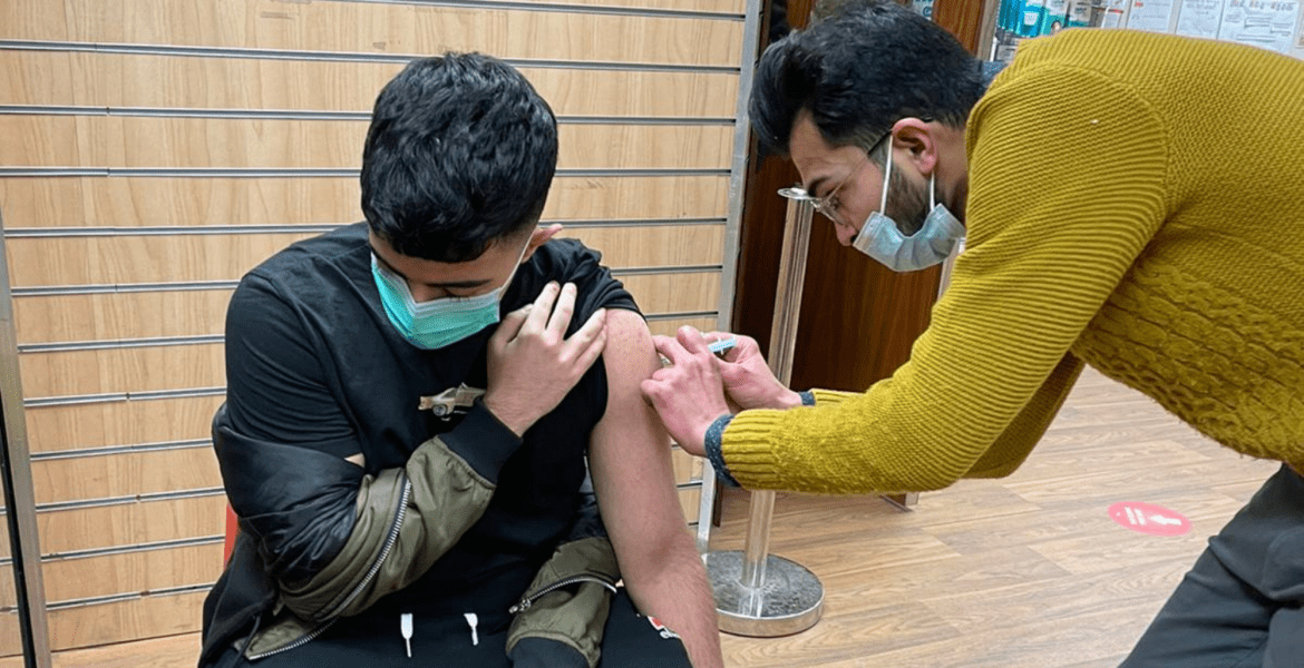Patient being vaccinated in the arm