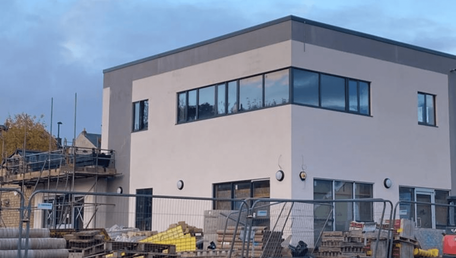 exterior of abrar rehman pharmacy surrounded by construction equipment